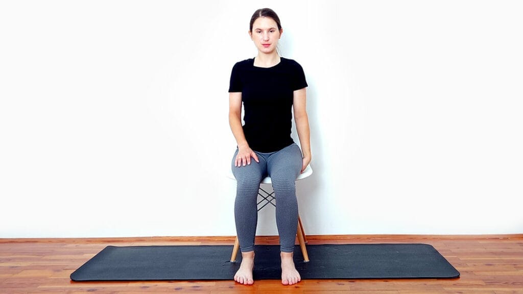 Iztezanje mišice Quadratus Lumborum v sedečem položaju korak 1